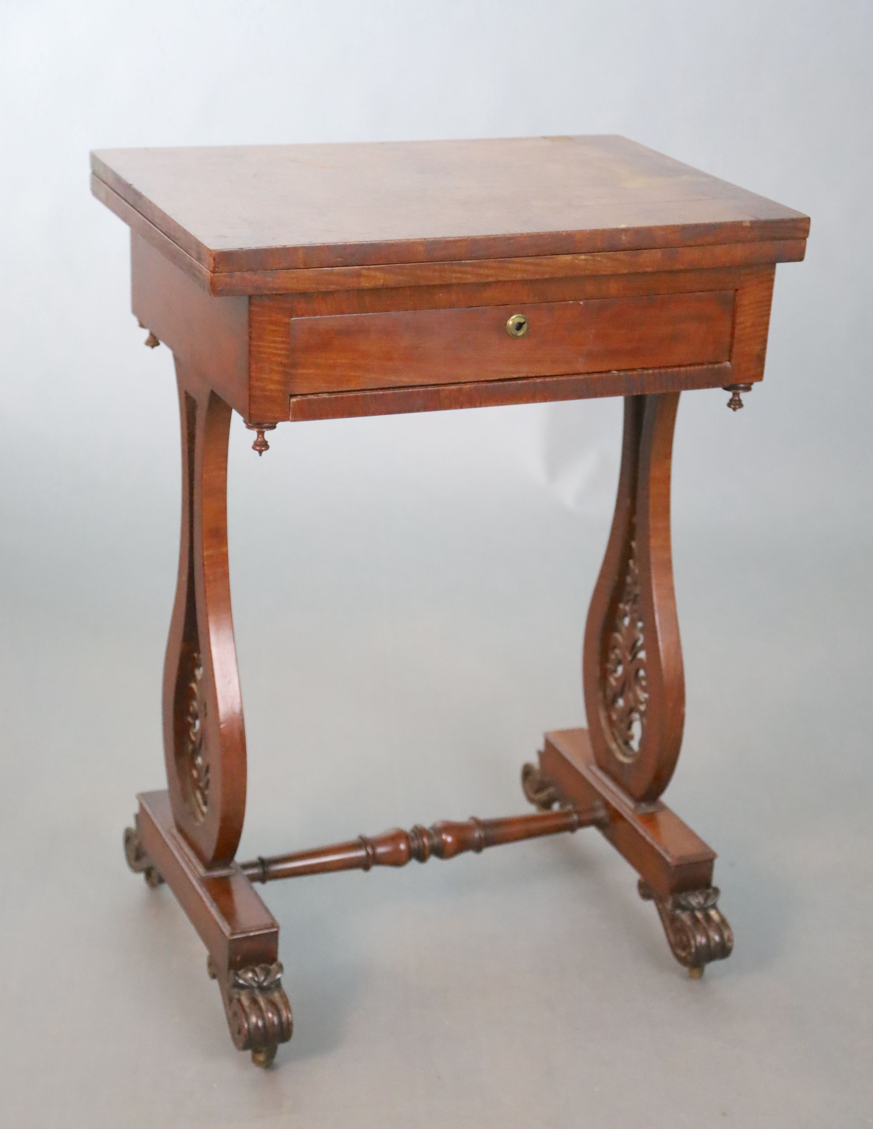 An early Victorian mahogany games / work table, W.53.5cm D.38cm H.76.5cm